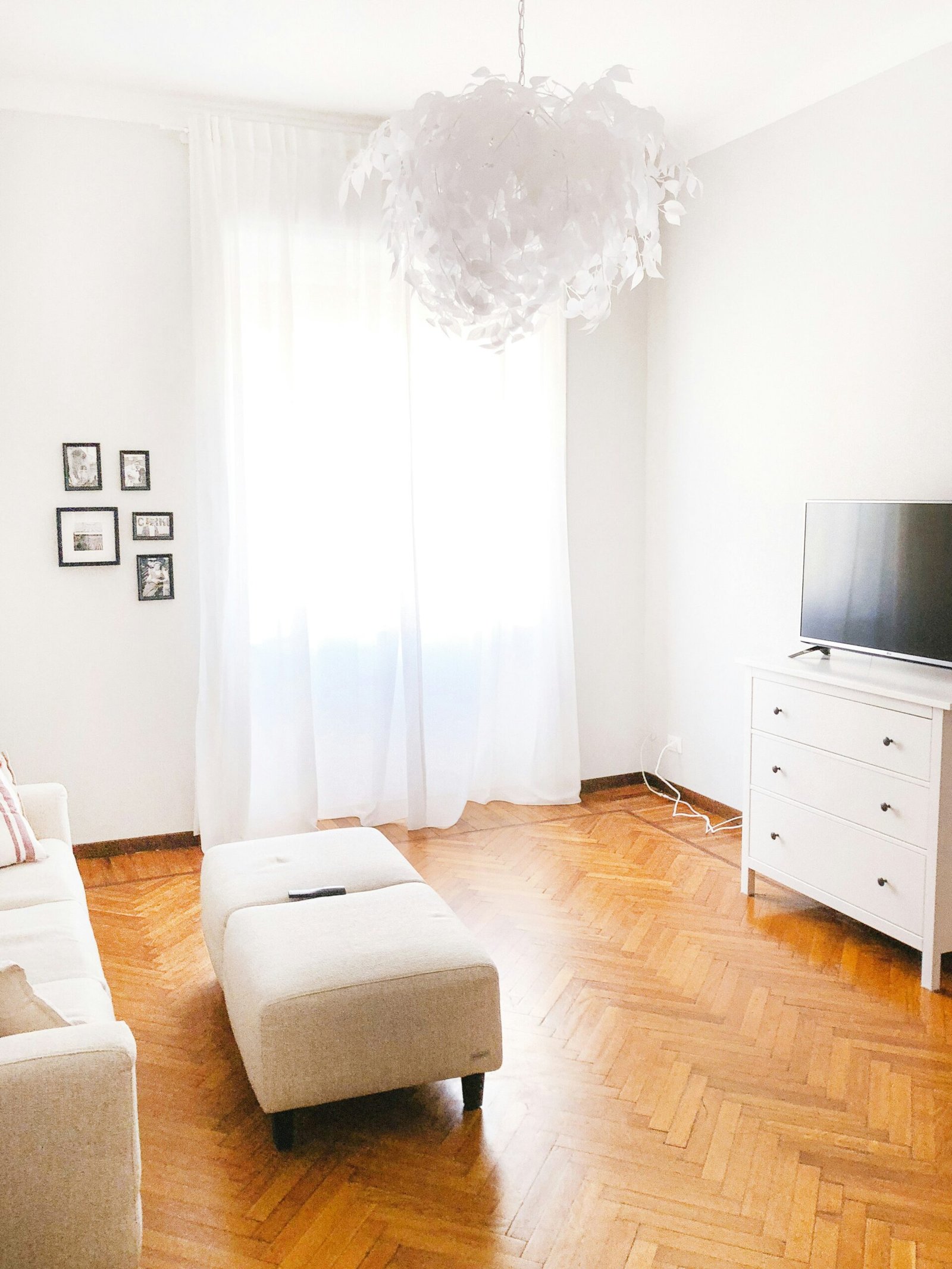 Find Top Interior Designers Specializing in Modern Home Decor Near You 1 turned-off flat screen television on white dresser